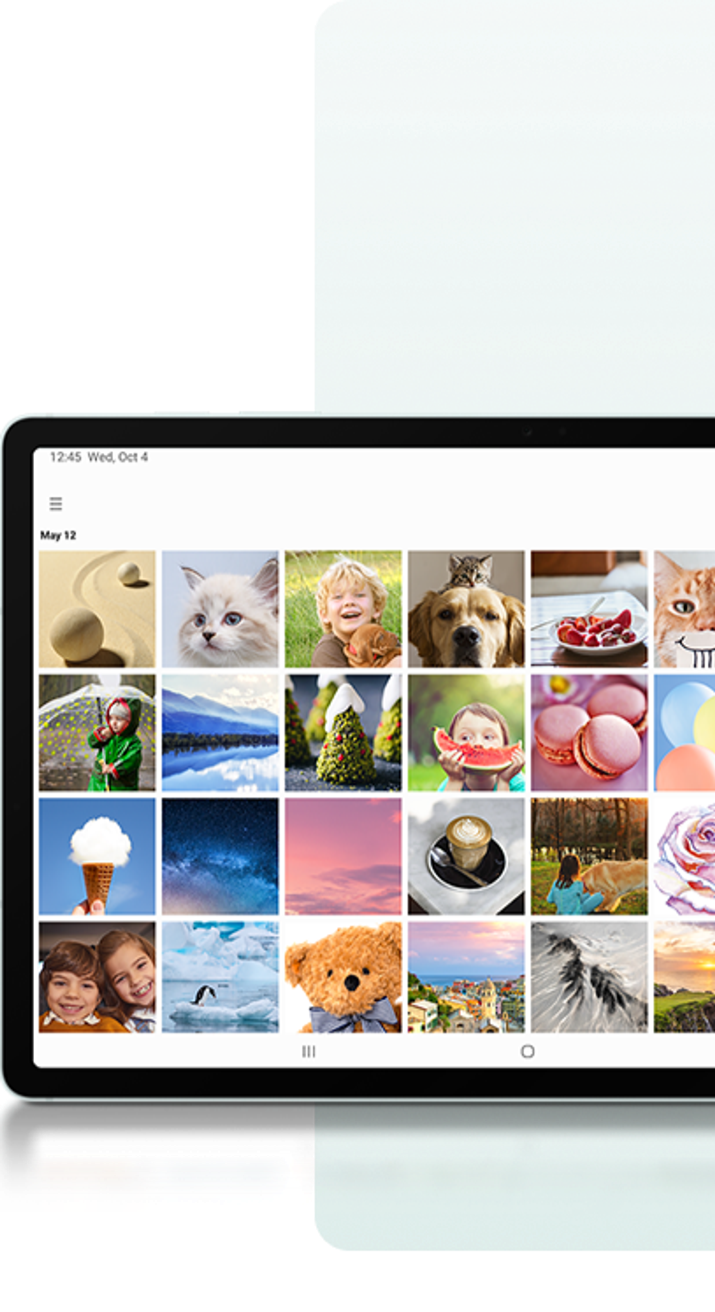 Photo of the Galaxy tablet with gallery app open showing many pictures in a grid layout.